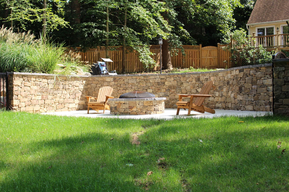 Inspiration for a large rustic backyard custom-shaped natural home design remodel in DC Metro with decking