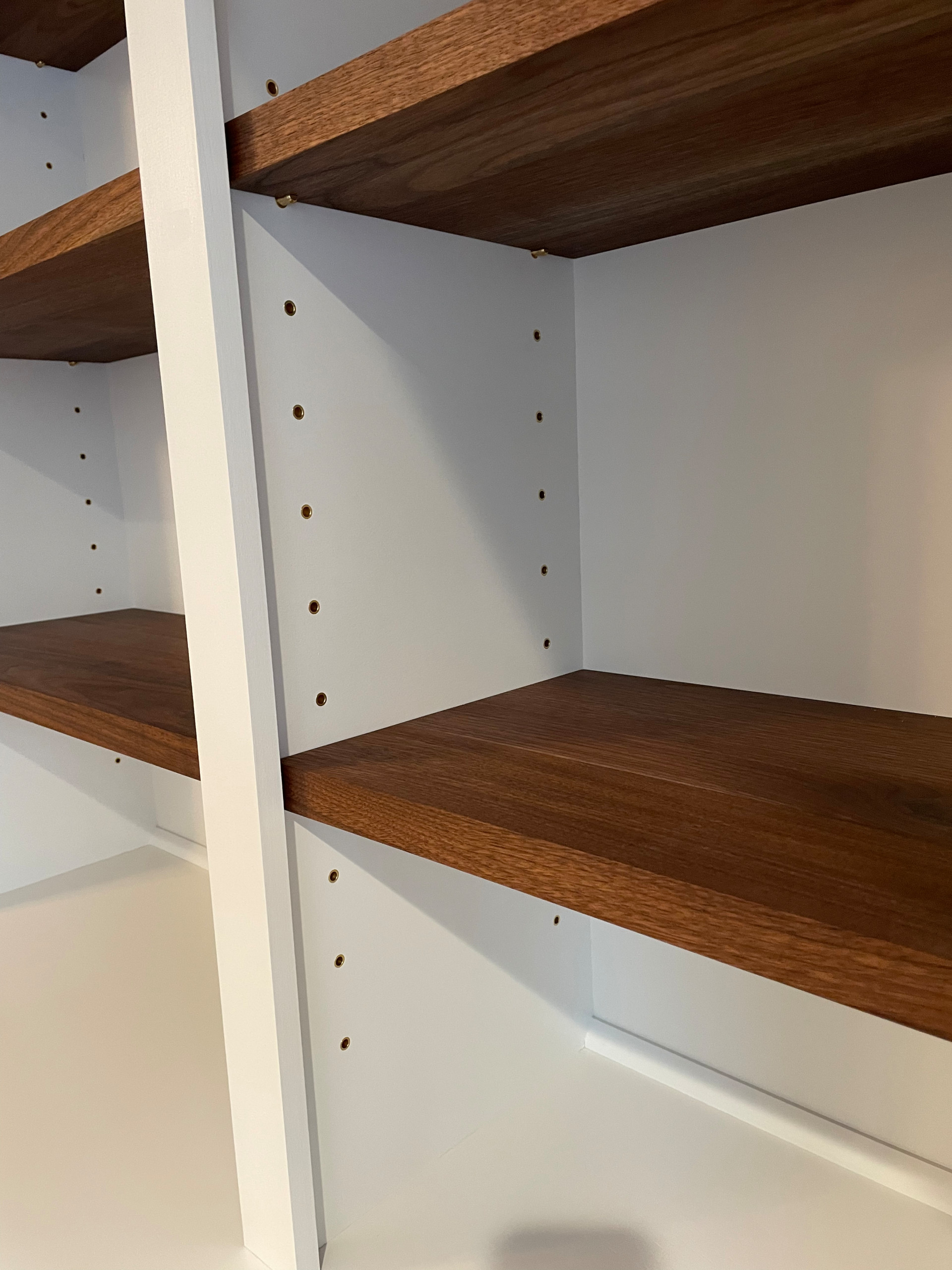 Custom built in with solid walnut shelves