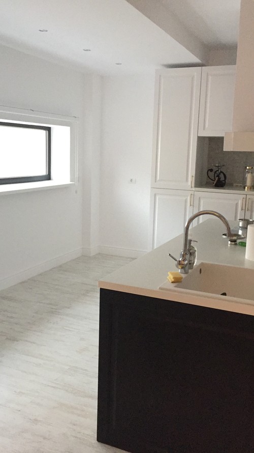 How to fill up an empty space in my kitchen?