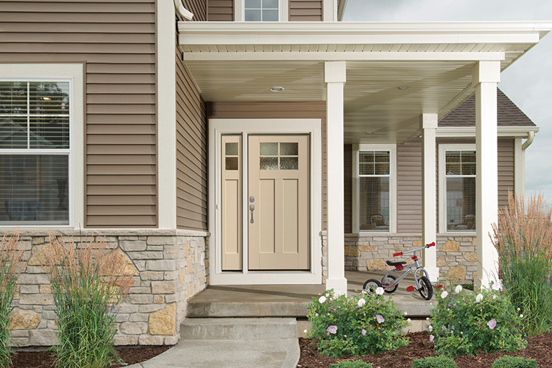 Inspiration for a craftsman single front door remodel with a white front door