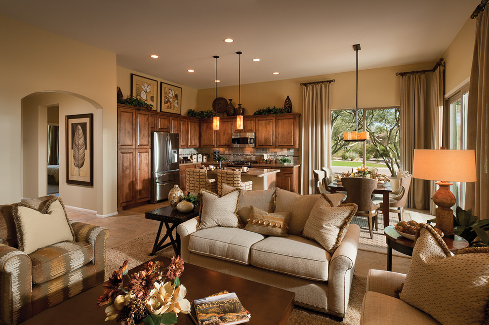 Inspiration for a mid-sized transitional l-shaped open concept kitchen remodel in Phoenix with raised-panel cabinets, medium tone wood cabinets, quartz countertops, gray backsplash, slate backsplash, stainless steel appliances and an island