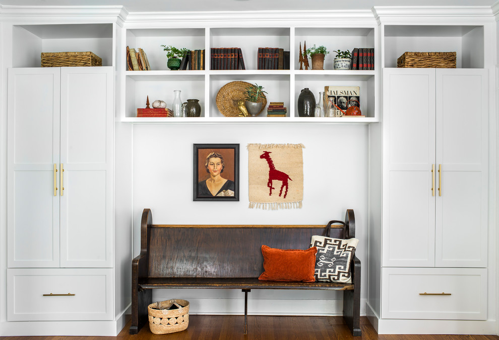 Mudroom - transitional medium tone wood floor mudroom idea in Atlanta with white walls
