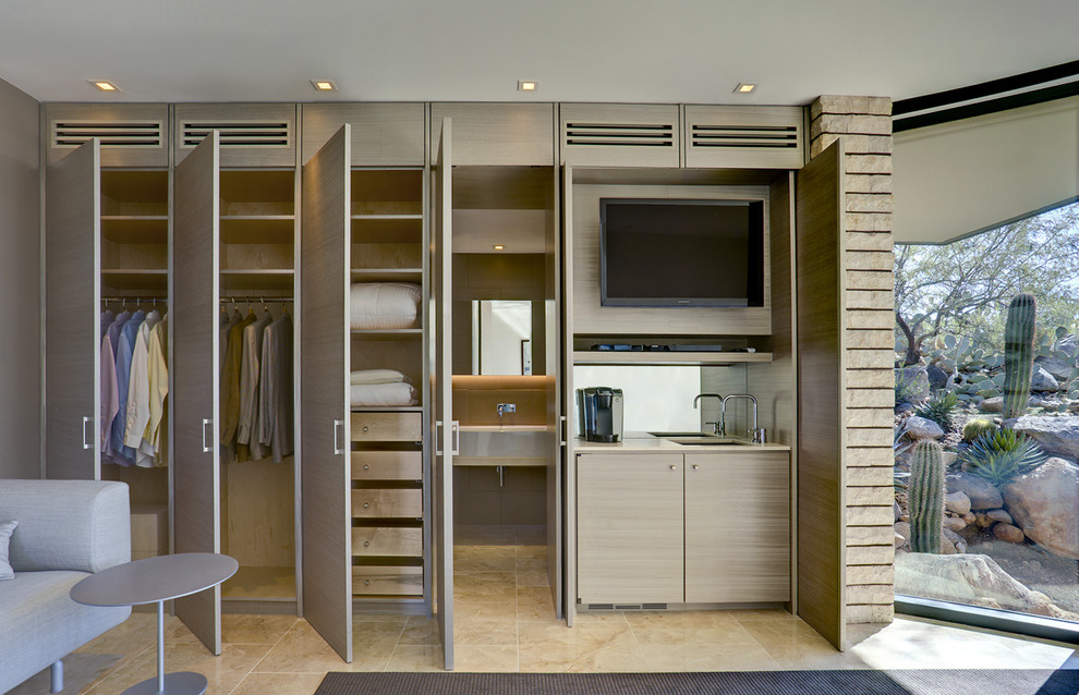 This is an example of a contemporary storage and wardrobe in Phoenix.