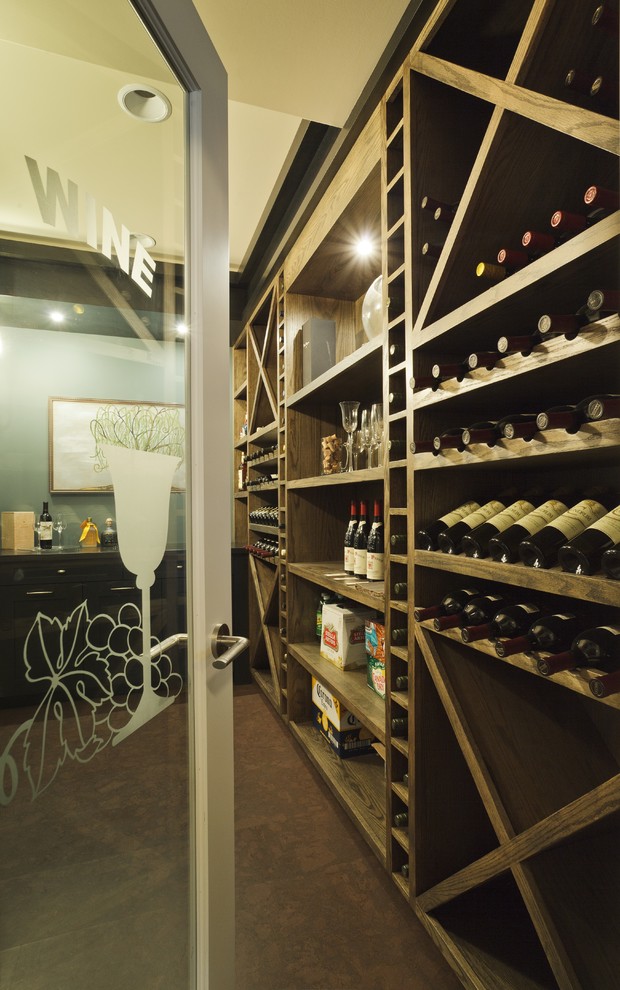 This is an example of a transitional wine cellar in Calgary.