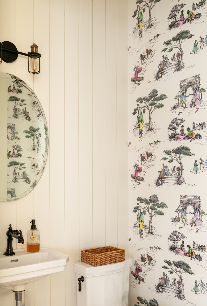 Ramsey House - Powder room - farmhouse shiplap wall and wallpaper powder room idea in Austin with multicolored walls and a wall-mount sink