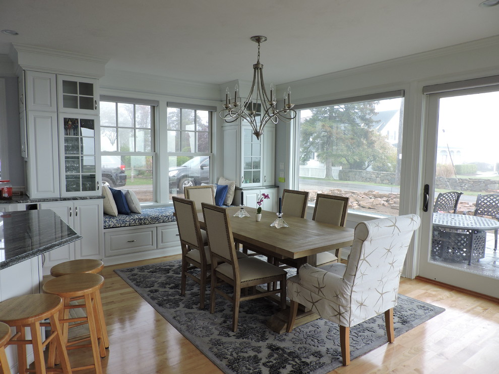 Inspiration for a large coastal light wood floor and beige floor kitchen/dining room combo remodel with white walls and no fireplace