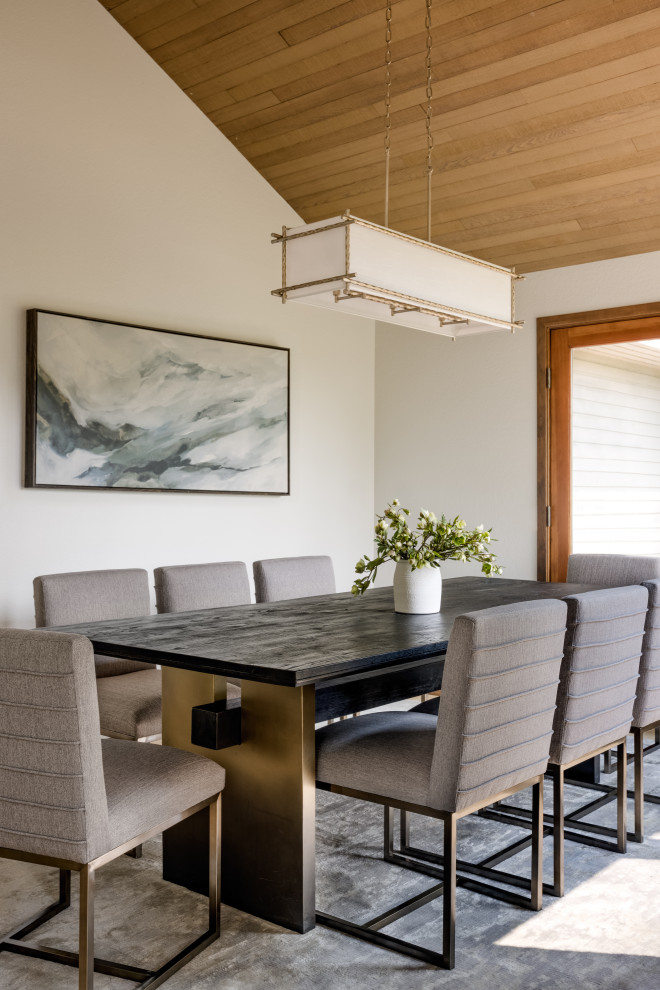 Mid-sized trendy carpeted enclosed dining room photo in Seattle with beige walls and no fireplace