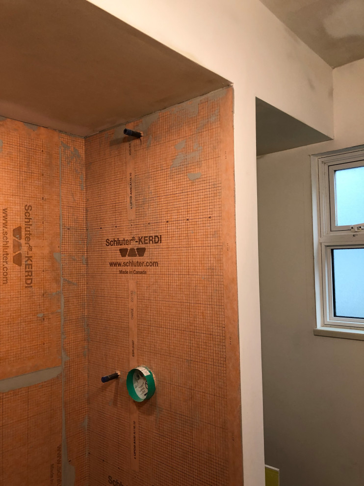 Should I tile the shower side wall?