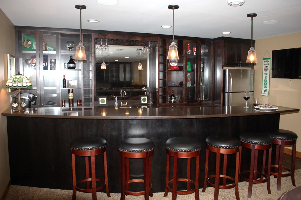 Inspiration for a large transitional u-shaped seated home bar in Other with an undermount sink, recessed-panel cabinets, dark wood cabinets and ceramic floors.