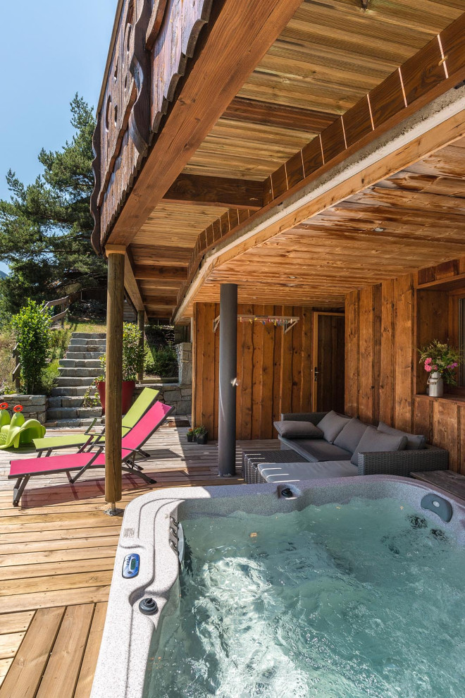 Inspiration pour une terrasse chalet.