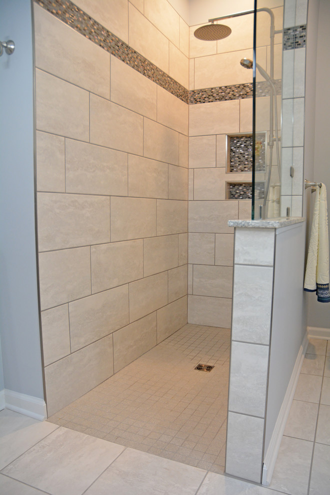 Mid-sized transitional master bathroom in Other with flat-panel cabinets, grey cabinets, an open shower, a two-piece toilet, gray tile, porcelain tile, grey walls, porcelain floors, an undermount sink, engineered quartz benchtops, grey floor, an open shower and grey benchtops.