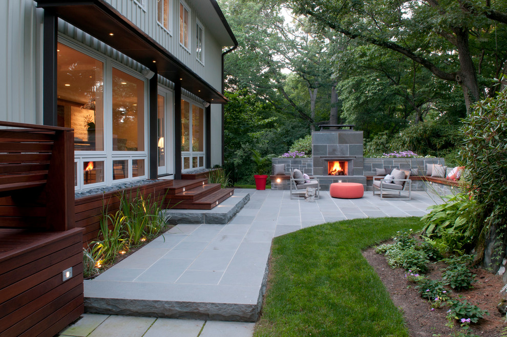 This is an example of a midcentury patio in Boston.