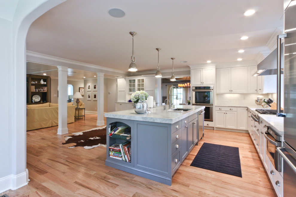 Design ideas for a traditional open plan kitchen in Newark with stainless steel appliances.