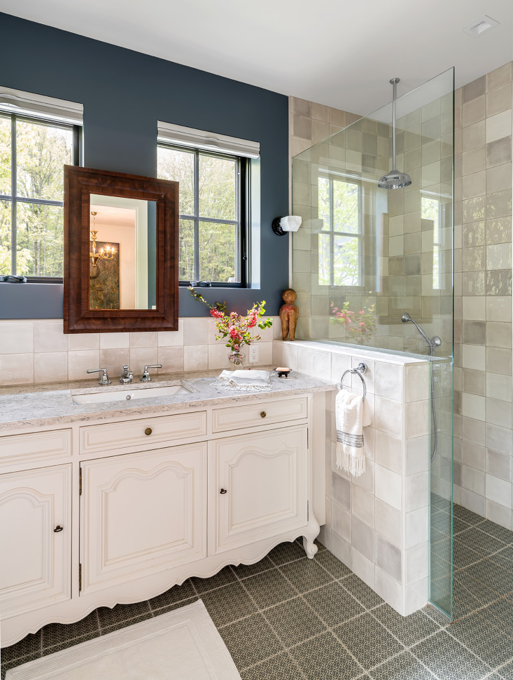 Inspiration for a country bathroom in Portland Maine with recessed-panel cabinets, white cabinets, an alcove shower, gray tile, blue walls, an undermount sink, grey floor, an open shower, grey benchtops, a single vanity and a built-in vanity.