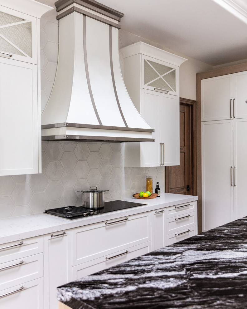 Large transitional u-shaped medium tone wood floor open concept kitchen photo in Atlanta with a double-bowl sink, shaker cabinets, light wood cabinets, quartz countertops, white backsplash, ceramic backsplash, stainless steel appliances, an island and white countertops