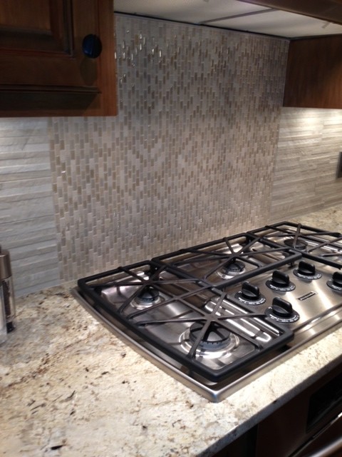 Example of a transitional kitchen design in Omaha