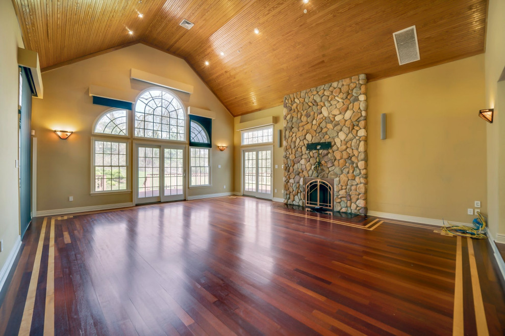 Wall next to shallow fireplace