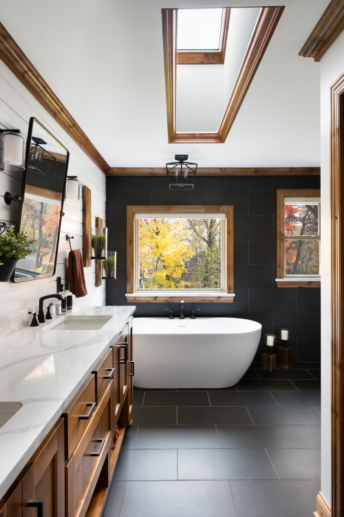  large cottage master black tile and porcelain tile double-sink, black floor and shiplap wall freestanding bathtub remodel in Minneapolis with shaker cabinets, quartz countertops, white countertops, a built-in vanity, dark wood cabinets, white walls and an undermount sink