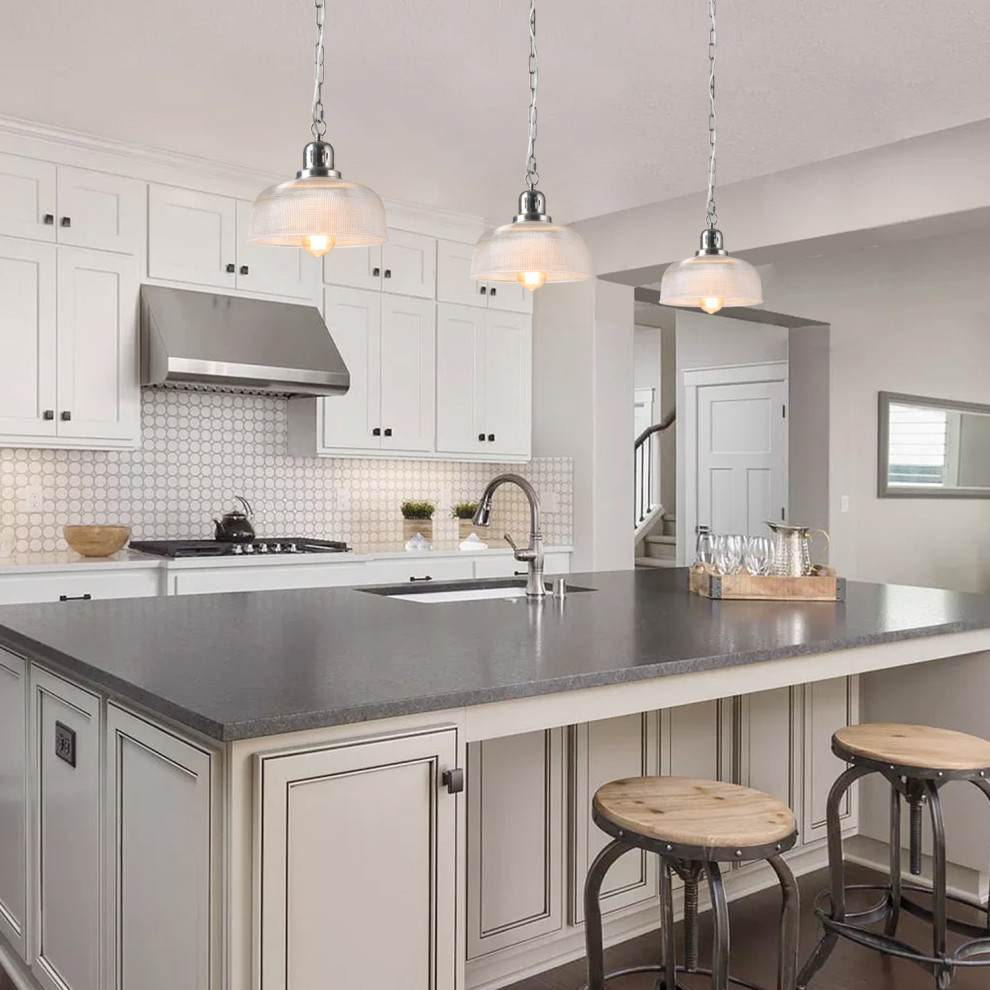 Mid-sized modern u-shaped eat-in kitchen in Atlanta with a drop-in sink, beaded inset cabinets, white cabinets, concrete benchtops, beige splashback, ceramic splashback, stainless steel appliances, brick floors, with island, brown floor and beige benchtop.