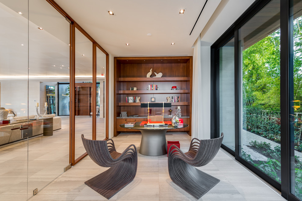 Inspiration for a contemporary freestanding desk gray floor home office remodel in Miami