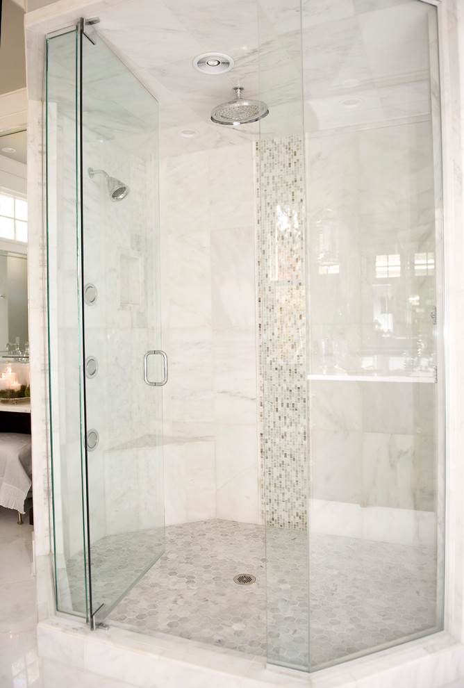 Large transitional master gray tile gray floor drop-in bathtub photo with shaker cabinets, dark wood cabinets, gray walls, an undermount sink and a hinged shower door