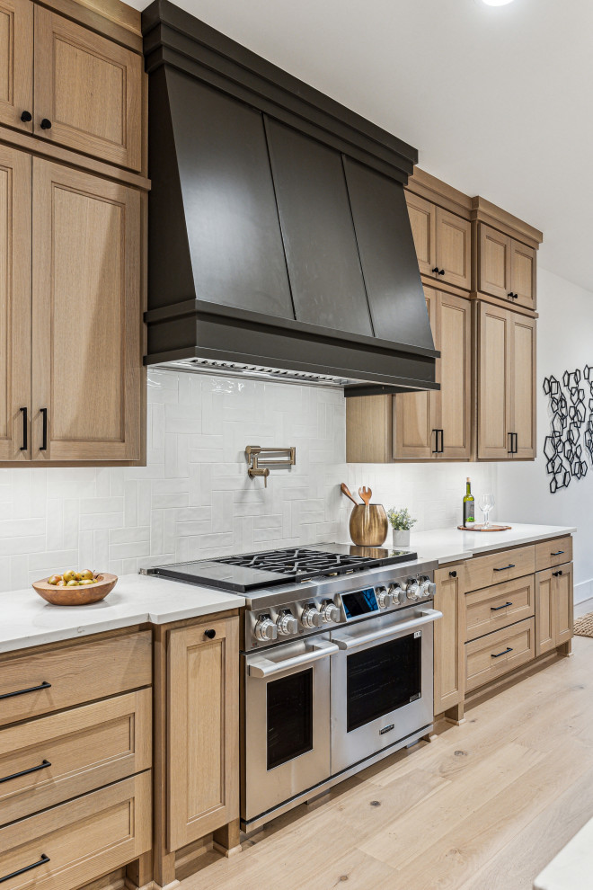 Example of a transitional kitchen design in Houston