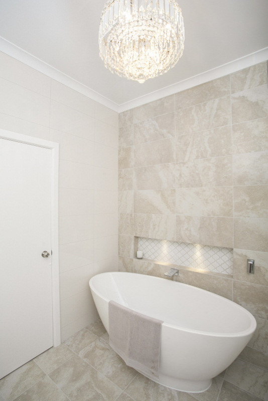 Design ideas for a contemporary bathroom in Perth with porcelain tile and porcelain floors.