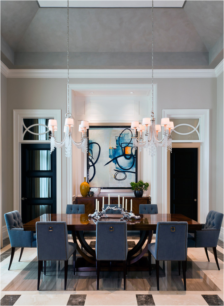 This is an example of a traditional separate dining room in Miami with beige walls and no fireplace.