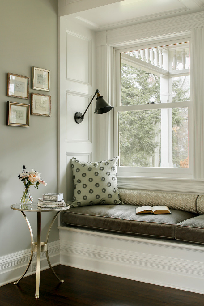 Inspiration for a traditional family room in Boston with grey walls and dark hardwood floors.