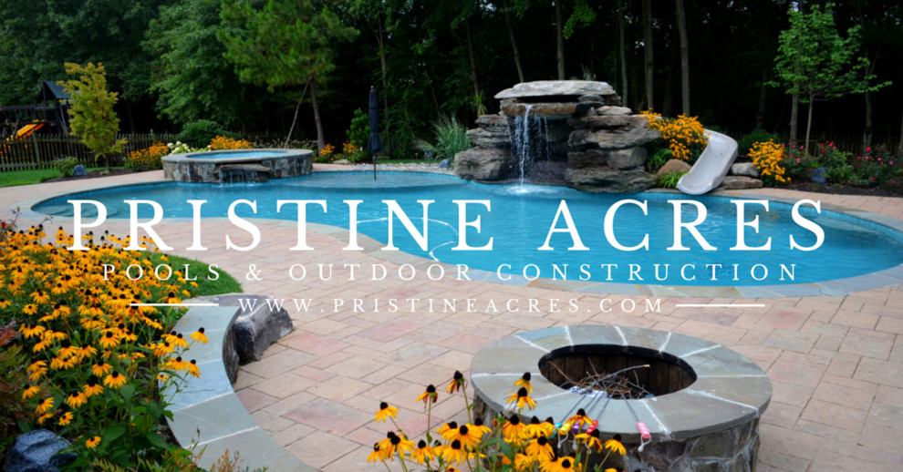 Inspiration for a huge transitional backyard concrete paver and freeform natural water slide remodel in DC Metro