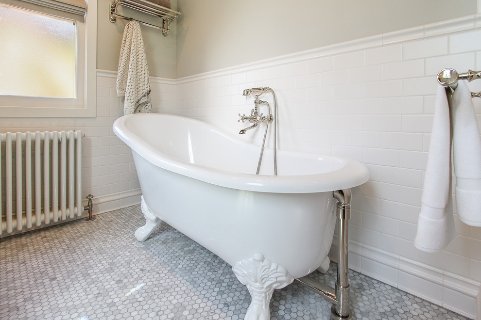 Design ideas for a mid-sized traditional master bathroom in Chicago with flat-panel cabinets, medium wood cabinets, a claw-foot tub, an open shower, a two-piece toilet, gray tile, multi-coloured tile, white tile, subway tile, green walls, mosaic tile floors, an undermount sink and marble benchtops.