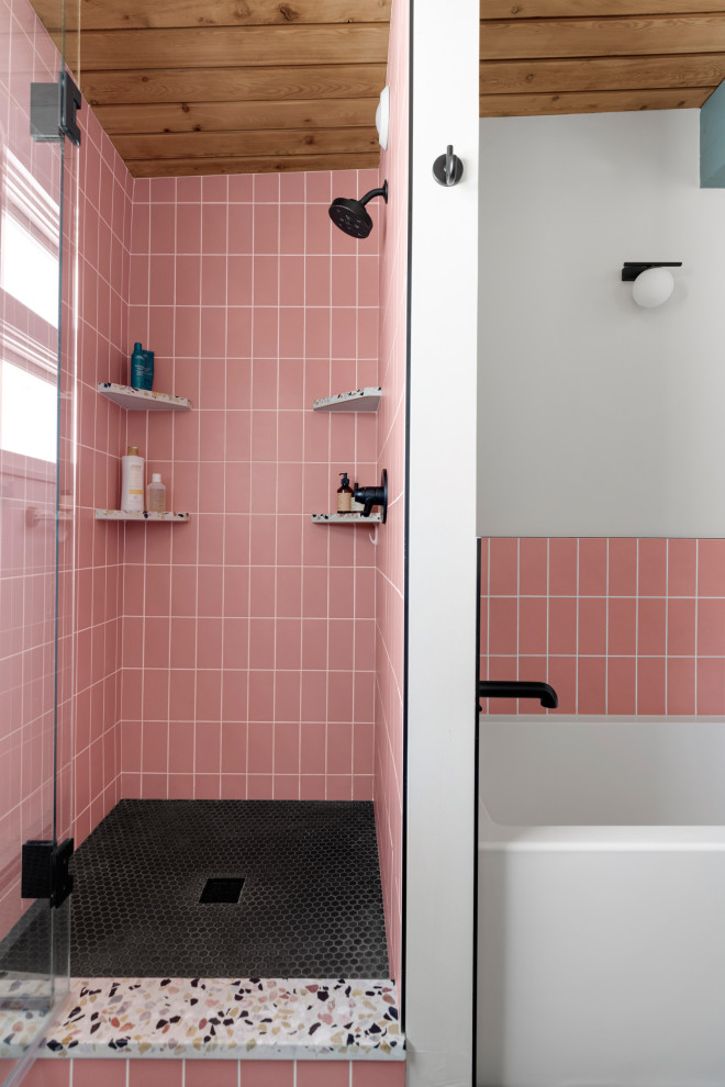 Inspiration for a retro ensuite bathroom in Minneapolis with flat-panel cabinets, medium wood cabinets, an alcove bath, a corner shower, a two-piece toilet, white walls, porcelain flooring, a submerged sink, terrazzo worktops, black floors, a hinged door, multi-coloured worktops, a wall niche, double sinks, a built in vanity unit and exposed beams.
