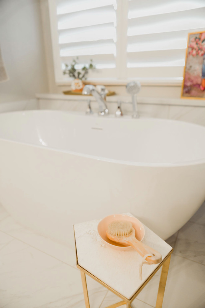 Freestanding bathtub - mid-sized modern master white tile porcelain tile and white floor freestanding bathtub idea in Dallas with flat-panel cabinets, brown cabinets, white walls, quartzite countertops, a hinged shower door and white countertops
