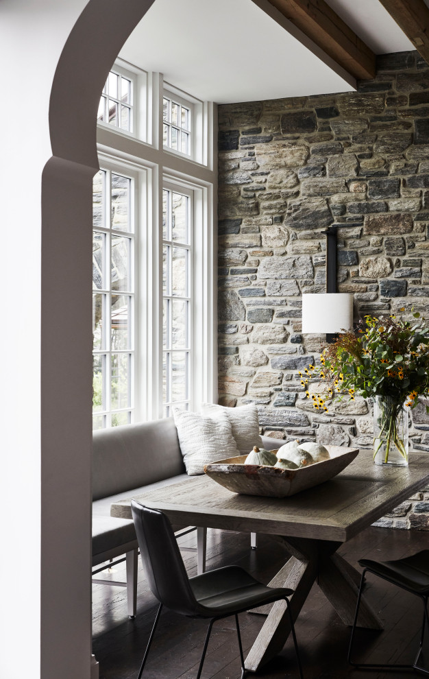 Example of a beach style dining room design in Portland Maine