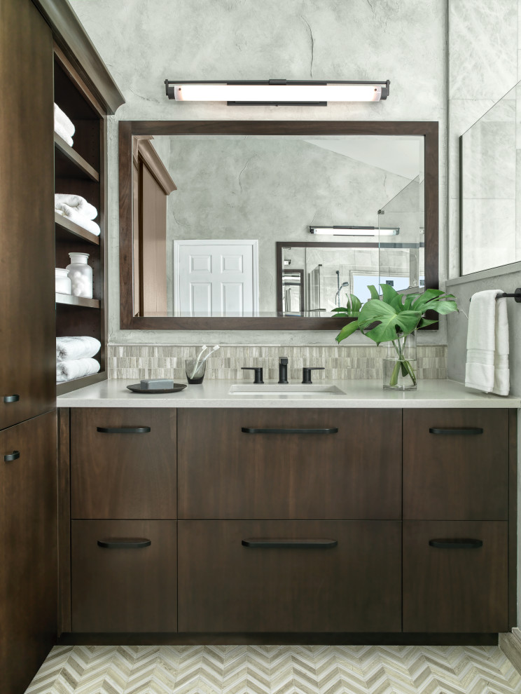 Photo of a medium sized modern ensuite bathroom in St Louis with flat-panel cabinets, dark wood cabinets, a corner shower, a two-piece toilet, marble tiles, grey walls, marble flooring, a submerged sink, quartz worktops, a hinged door, a shower bench, a single sink and a built in vanity unit.