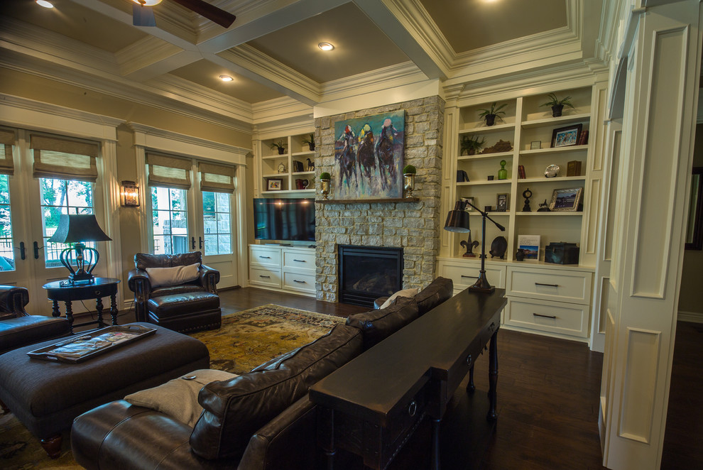 Inspiration for a large transitional formal enclosed living room in Louisville with beige walls, dark hardwood floors, a standard fireplace, a stone fireplace surround, no tv and brown floor.
