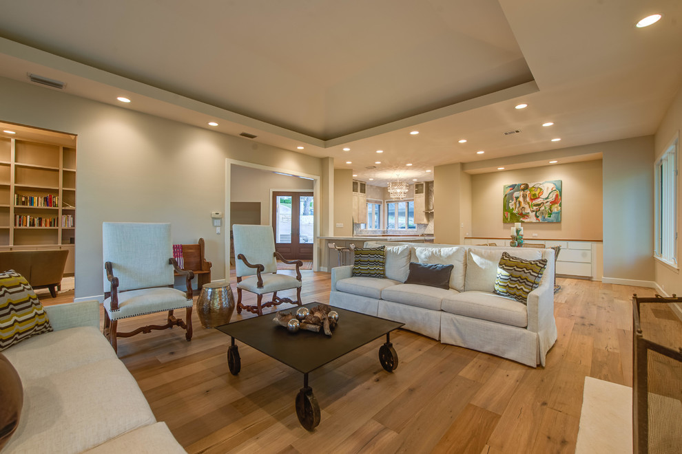 Photo of a traditional open concept living room in Austin with beige walls.