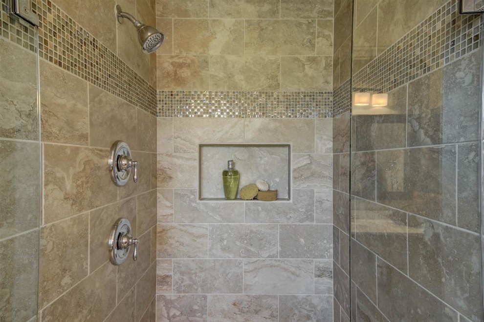 Photo of a small traditional master bathroom in Phoenix with a drop-in tub, an alcove shower, beige tile, porcelain tile and an integrated sink.