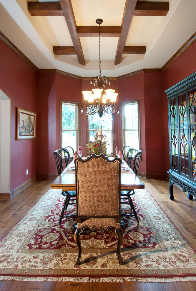 Mid-sized traditional kitchen/dining combo in Dallas with red walls, medium hardwood floors and no fireplace.