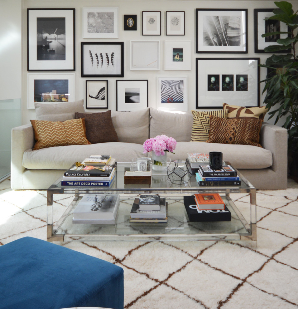 Inspiration for a contemporary formal living room in London with white walls.