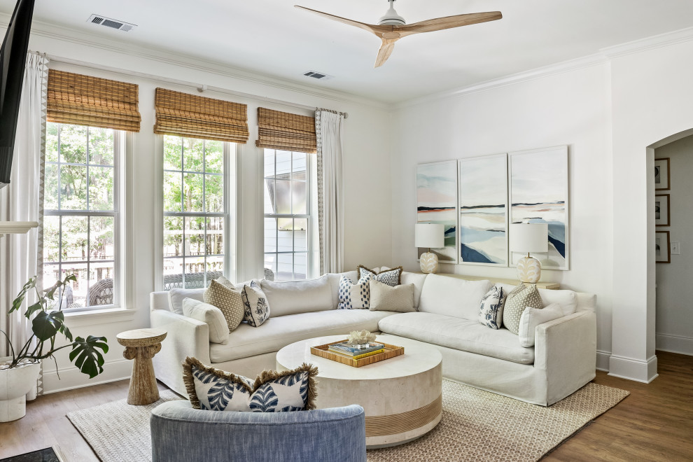 Example of a beach style living room design in Charleston