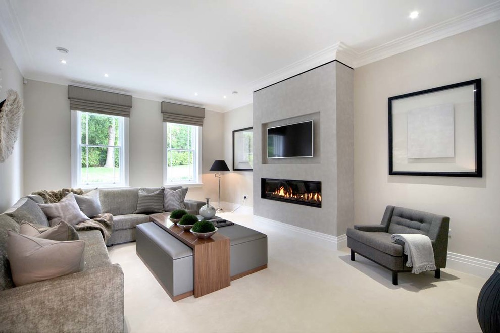 Design ideas for a contemporary living room in Surrey with grey walls, a ribbon fireplace and a wall-mounted tv.