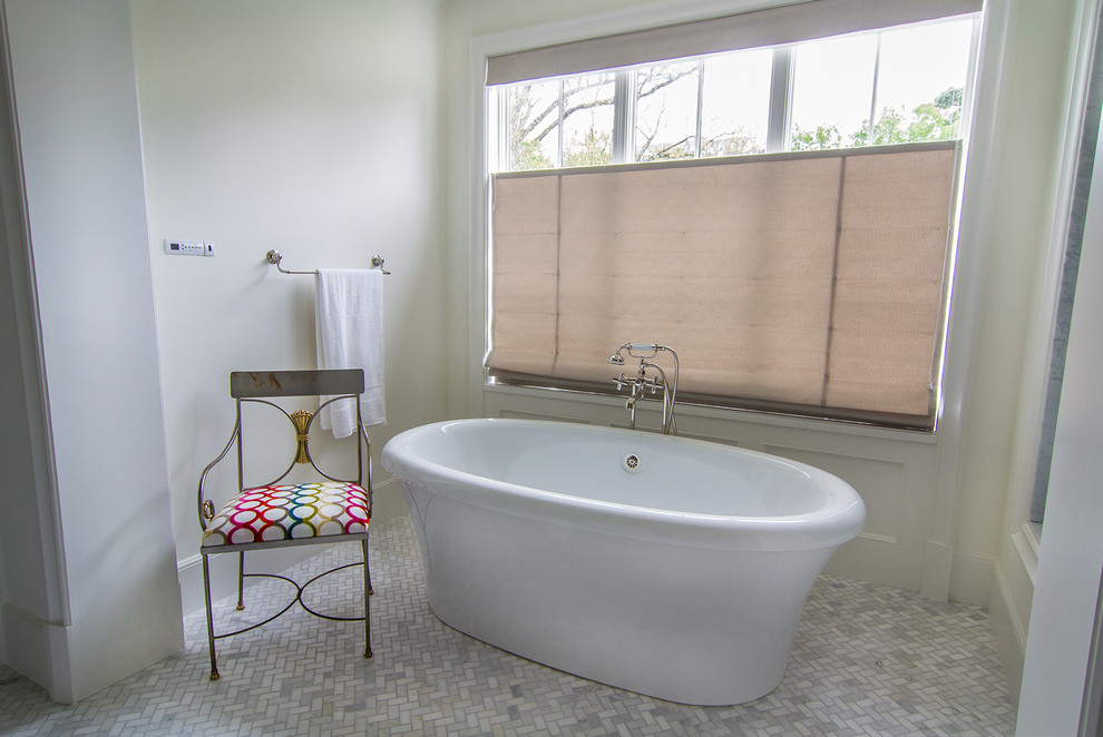Inspiration for a mid-sized transitional master bathroom remodel in Houston
