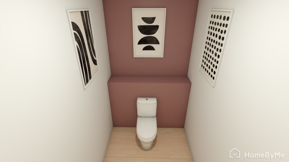 Immagine di un piccolo bagno di servizio con pareti rosa, pavimento in laminato e pavimento beige