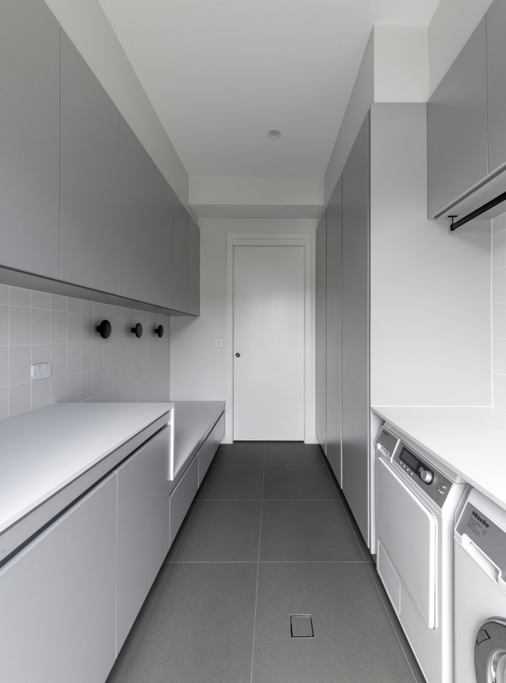 Photo of a contemporary laundry room in Brisbane.