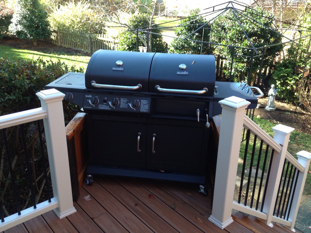 Mid-sized transitional backyard deck photo in Raleigh