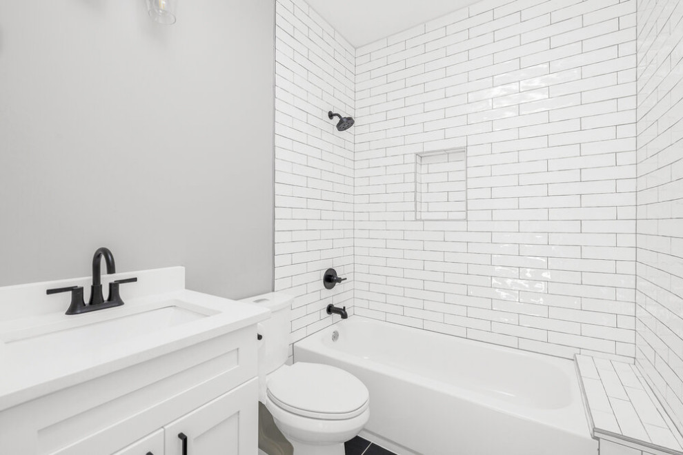 Inspiration for a large transitional kids bathroom in Atlanta with shaker cabinets, white cabinets, a freestanding tub, an alcove shower, a two-piece toilet, gray tile, ceramic tile, grey walls, ceramic floors, an undermount sink, quartzite benchtops, white floor, white benchtops, a niche, a single vanity and a freestanding vanity.