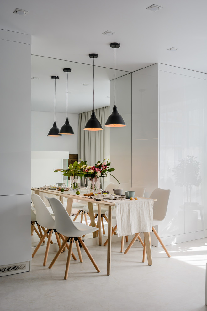 Inspiration for a mid-sized kitchen/dining combo in Novosibirsk with white walls, vinyl floors, a ribbon fireplace, a plaster fireplace surround and white floor.
