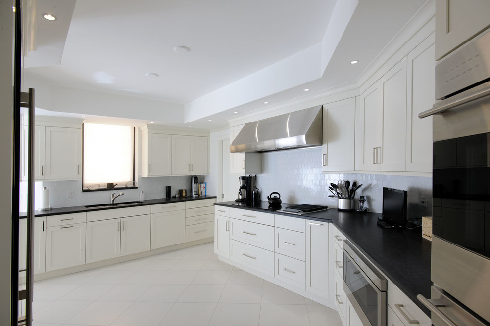 Transitional kitchen photo in Miami