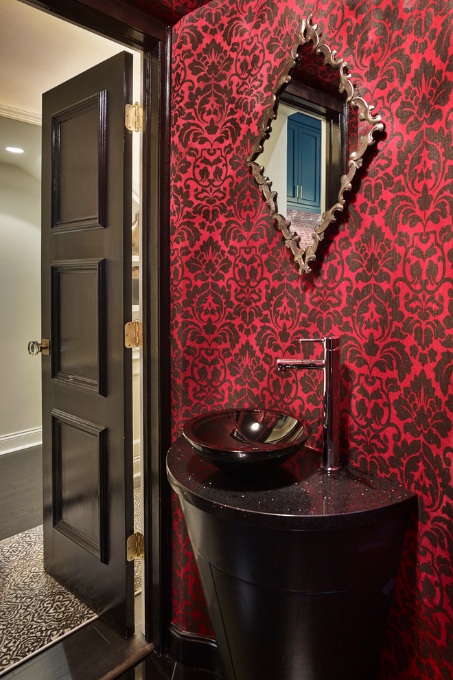 This is an example of a small contemporary bathroom in Philadelphia with furniture-like cabinets, black cabinets, a claw-foot tub, an alcove shower, a one-piece toilet, black tile, stone tile, red walls, marble floors, a vessel sink and engineered quartz benchtops.
